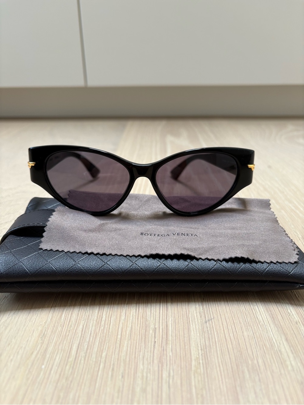 Bottega Veneta Black Cat-Eye Sunglasses with Gold Accents